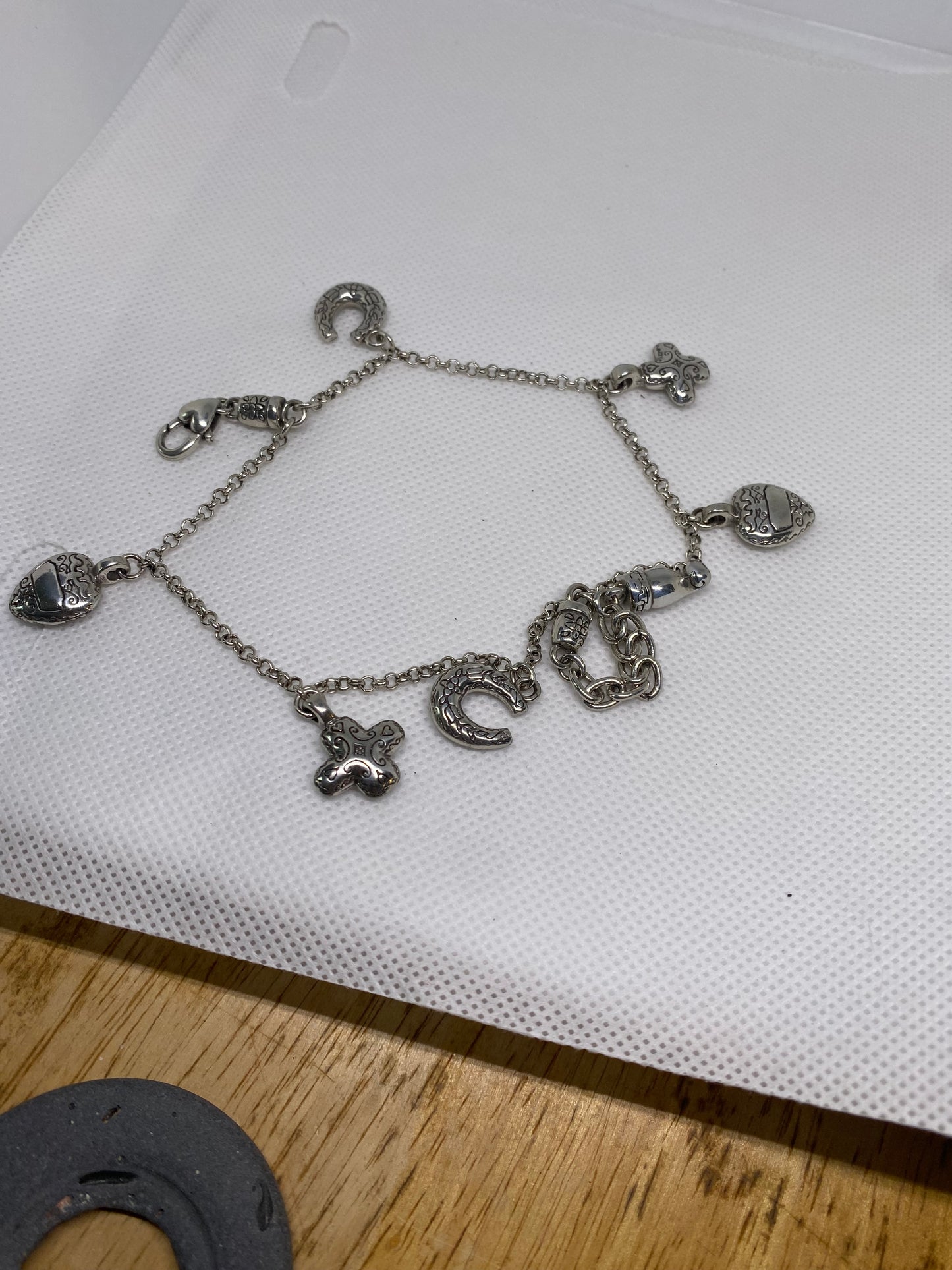 Brighton charm braclet sliver in tone hearts and hotshot cross, 7”