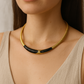 Monet omega checker stretch flex gold black enamel necklace