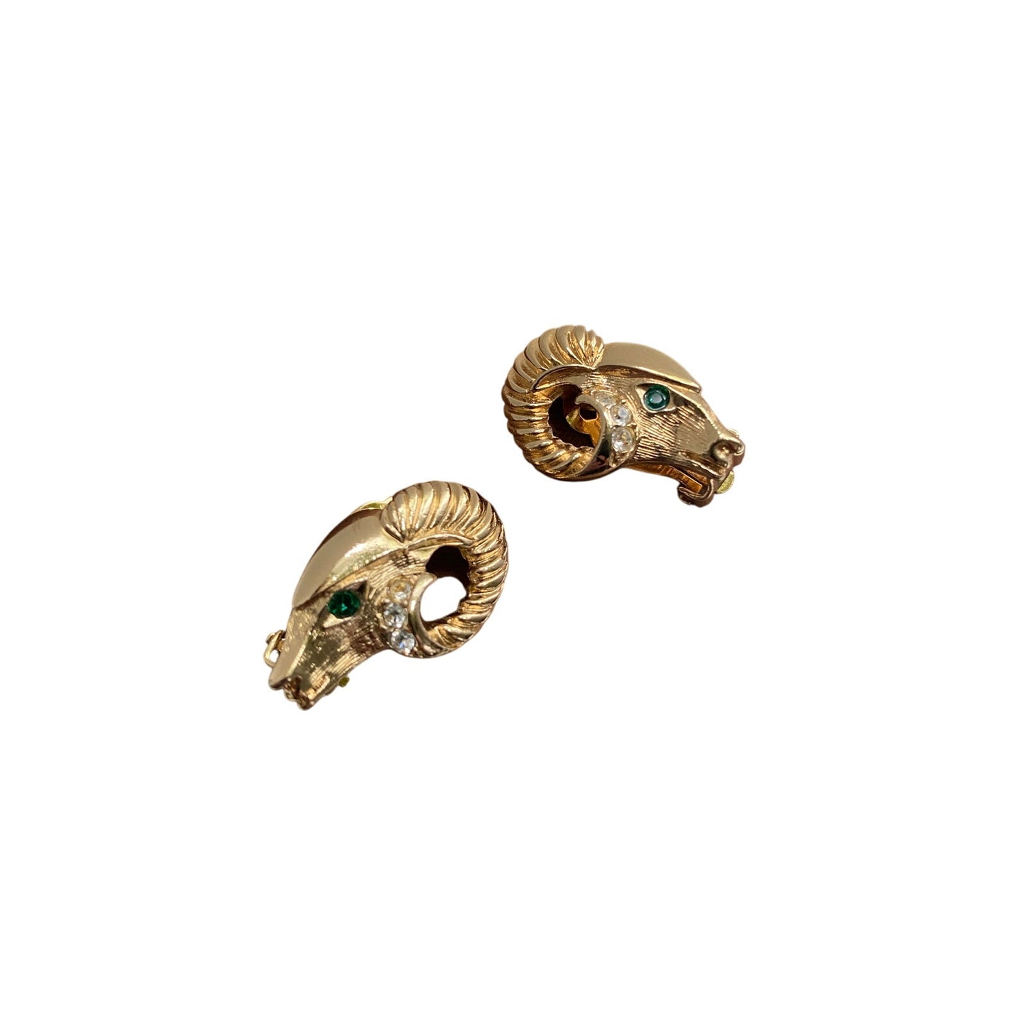 Vintage Kenneth jay Lane for Avon Ram's head in gold with green jeweled eye.