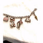Vintage 1960s Disney Mary Poppins charm bracelet original collectible with umbrella, carousel horse, Bert, Mary, and carpet bag.