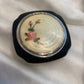 Evan’s Compact black enamel with Guilloche floral design powder