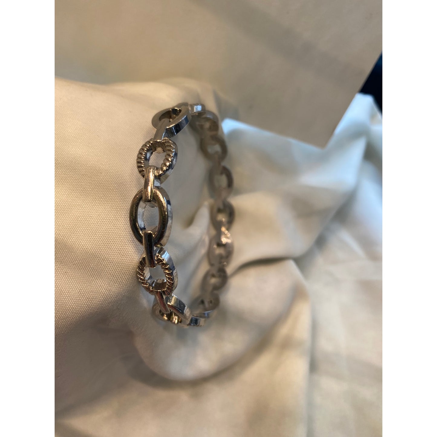 Set of 5 silver toned bracelets with Crystal accents